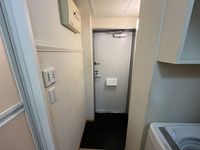 レオパレストウメイ 玄関