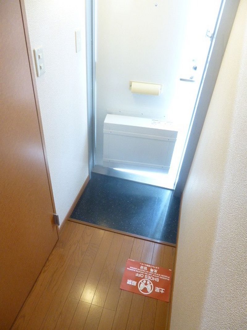 レオパレスコミュニティ 玄関