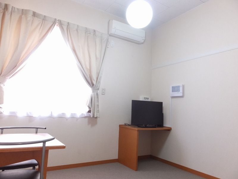レオパレスニューハイツ　コスモ 居間