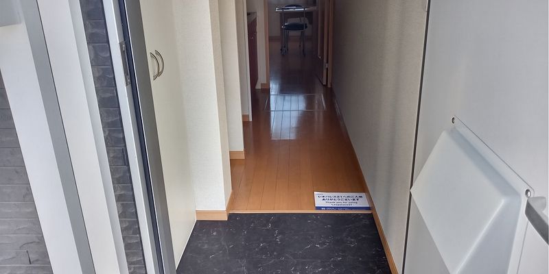 レオネクストエフ　ニイジマⅤ 玄関