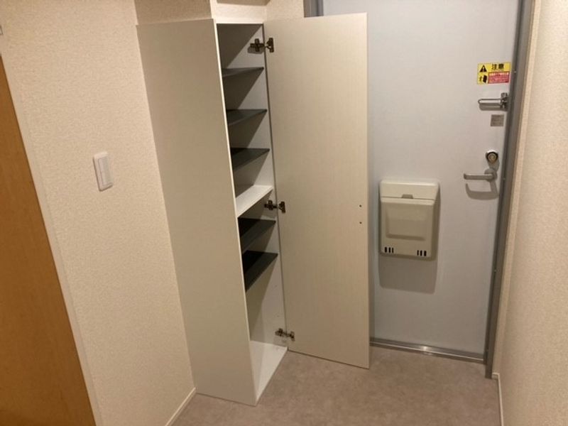 レオネクストオリーブ 玄関