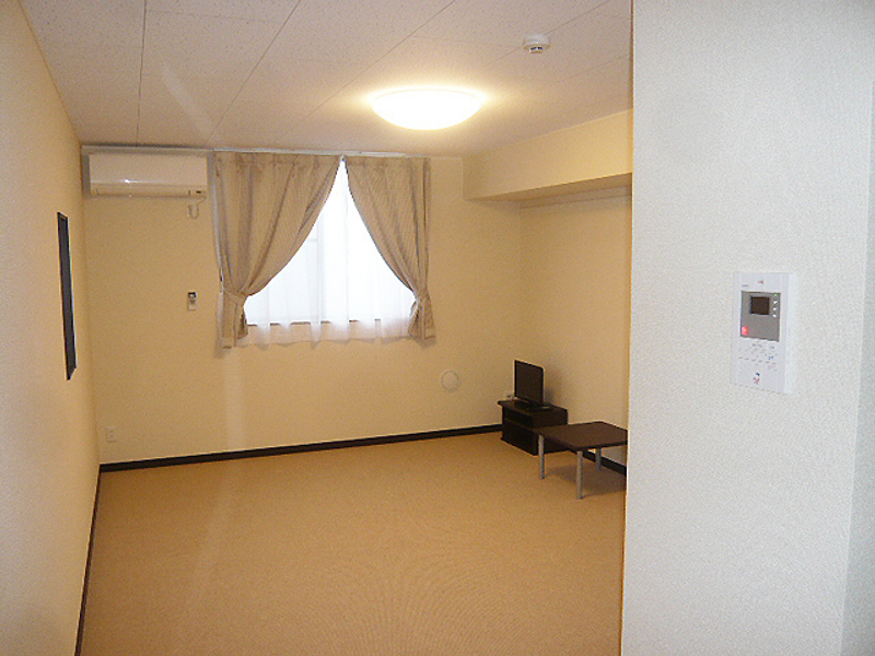 レオネクストハピネスしだみ 居間