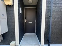 レオネクストサン　カーム 玄関