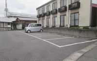 レオパレスグランカーサ 駐車場