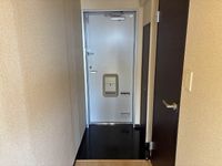 レオネクストニシダイ 玄関