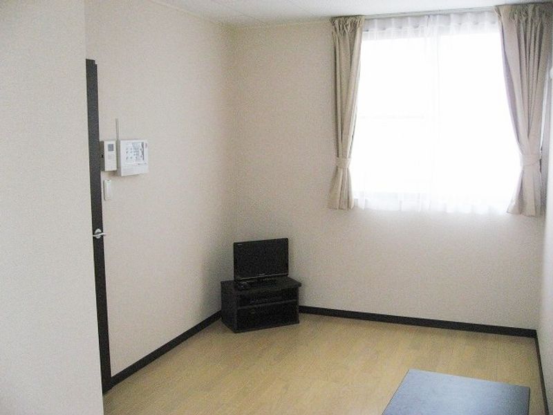 レオネクストグランディ　宮城野 居間