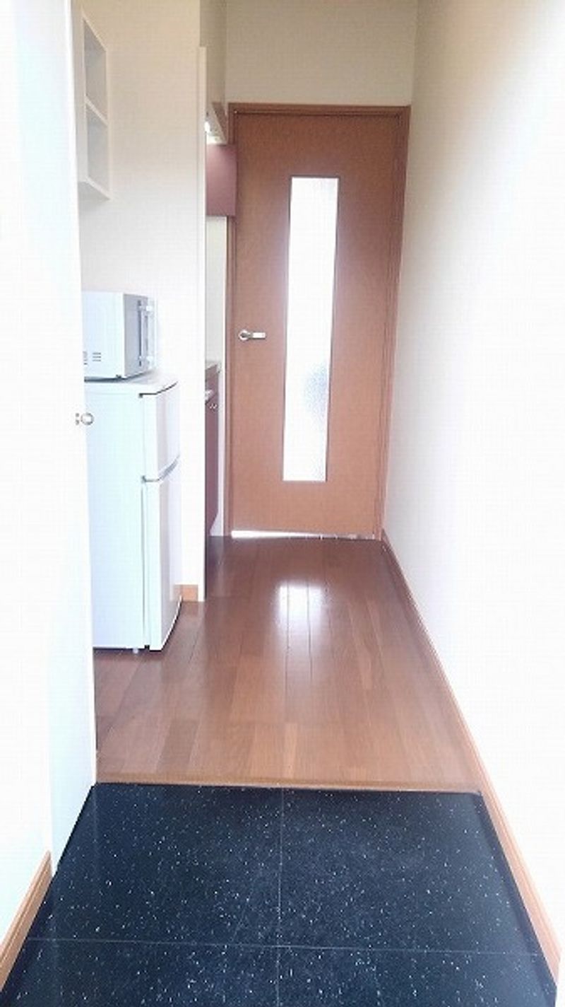 レオパレスガーネット合川 玄関