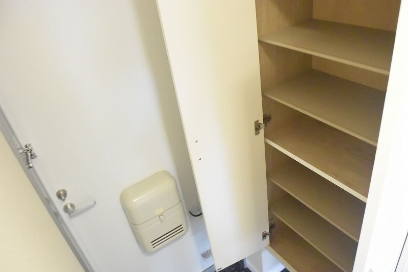 レオネクストコンフォート刀根山 玄関