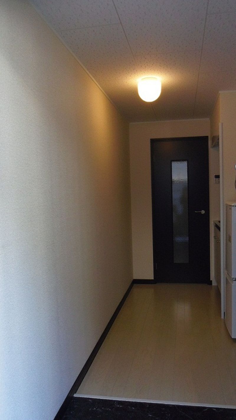 レオネクストクアドリフォリオ 玄関