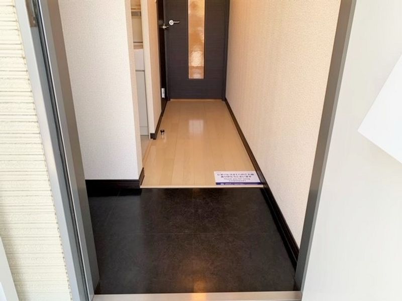 レオネクストクレソン　コマイ 玄関