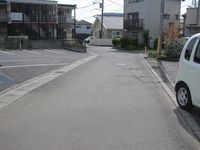 レオパレス赤い長ぐつ 駐車場
