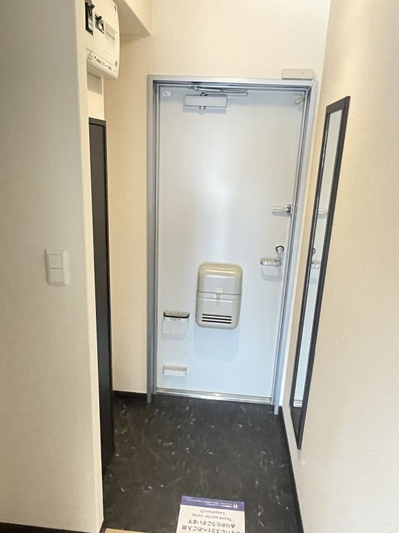 レオネクストＴＯＢＡⅢ 玄関