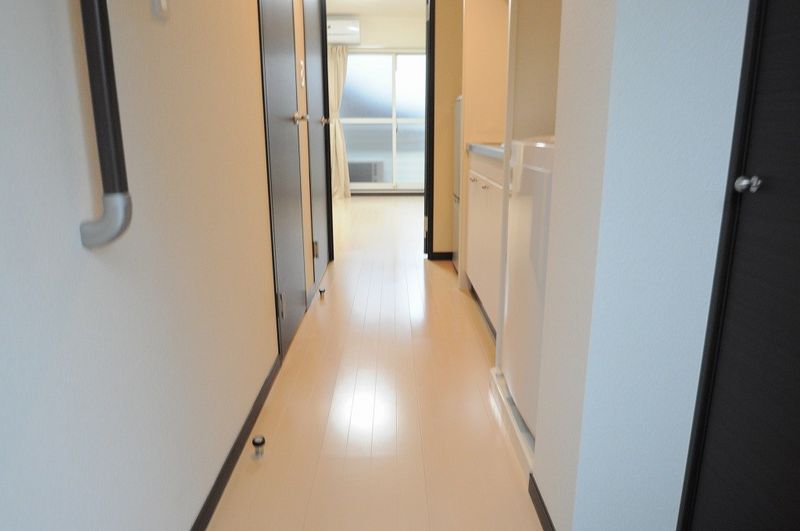 レオネクストシモイフク 玄関