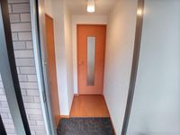 レオネクスト富 玄関